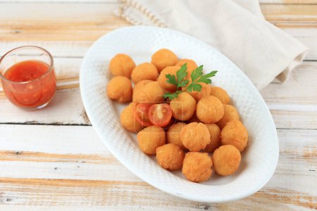 Homemade Potato Croquettes or Potato Ball Pom Pom with Red Sauce 
