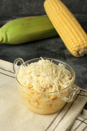 Steamed Corn with Sweet Condensed Milk and Shredded Cheese Topping. Known in Indonesia as jagung Susu keju or Jasuke
