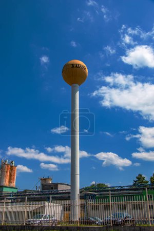 Photo for Bojnice, Slovakia - 06.11.2022: Water tower at the coal-fired power plant in Bojnice, Slovakia. Produces 1.2 TWh of electricity. Works on brown coal. Energy crisis. - Royalty Free Image