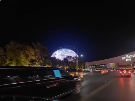 Photo for Las Vegas, Nevada, USA - 08.13.2023: MSG Sphere exosphere in Las Vegas, Nevada at night. View from the window of a moving car. - Royalty Free Image