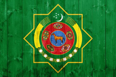 Téléchargez les photos : Drapeau et armoiries du Turkménistan sur fond texturé. Collage conceptuel. - en image libre de droit