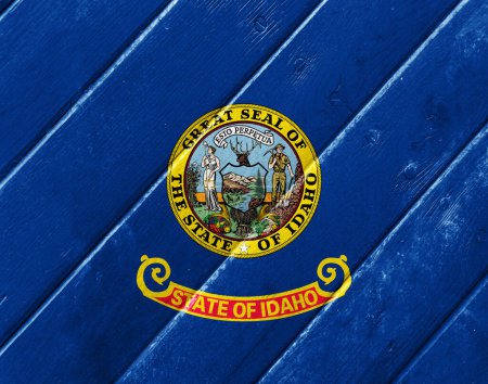 Téléchargez les photos : Flag of Idaho US state on a textured background. Concept collage. - en image libre de droit