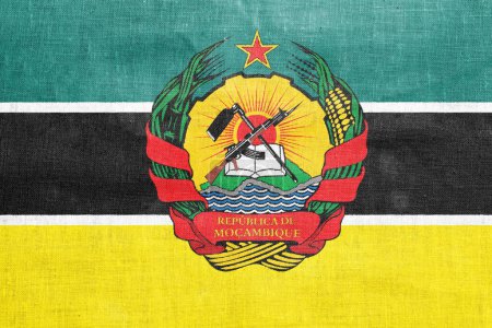 Flag and coat of arms of Republic of Mozambique on a textured background. Concept collage.