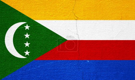 Flagge der Union der Komoren auf einem strukturierten Hintergrund. Konzeptcollage.