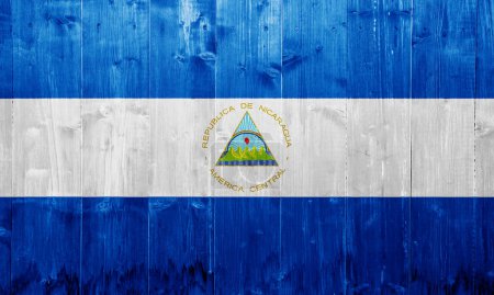 Drapeau de la République du Nicaragua sur fond texturé. Collage conceptuel.