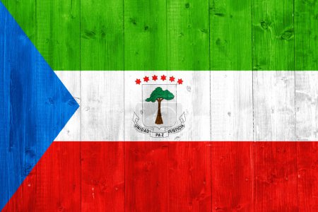 Flag of Republic of Equatorial Guinea on a textured background. Concept collage.