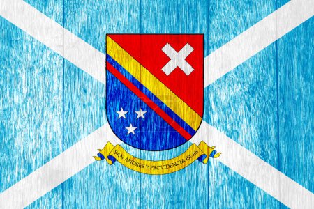 Bandera y escudo de armas de San Andrés, Providencia y Santa Catalina fondo texturizado. Concepto collage.