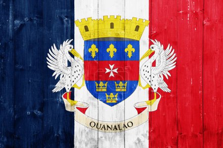 Drapeau Saint-Barthélemy sur le drapeau de France sur fond texturé. Collage conceptuel.