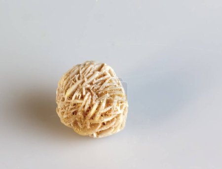 Desert Rose, Natural Crystal on white background, close up photography