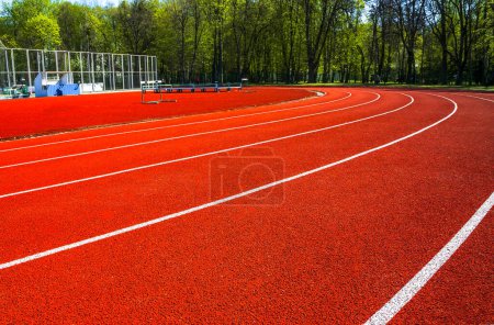 Photo for Red treadmills at the stadium.Running Track . - Royalty Free Image