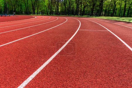 Photo for Red treadmills at the stadium.Running Track . Red racetracks on the sports arena. Stadium. - Royalty Free Image