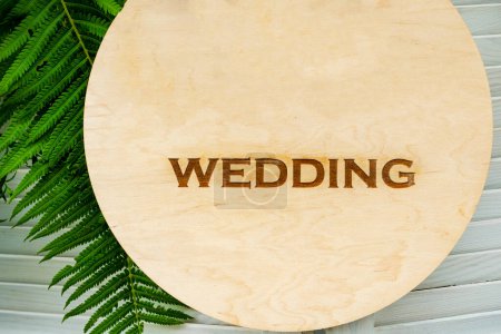 Photo for Board sign newlywed, wedding, marriage. pointing for wedding ceremony location. just married text sign. just married on wooden background - Royalty Free Image