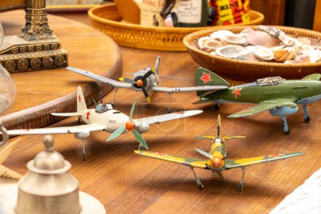 wooden models of airplanes from the second world war in antique shop