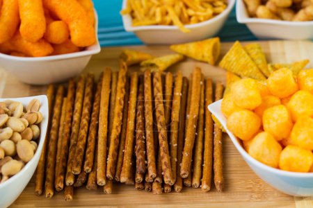 Photo for Salty snacks on the table ready to party - Royalty Free Image