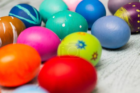Photo for Colorful collection of patterned easter eggs on wooden table - Royalty Free Image