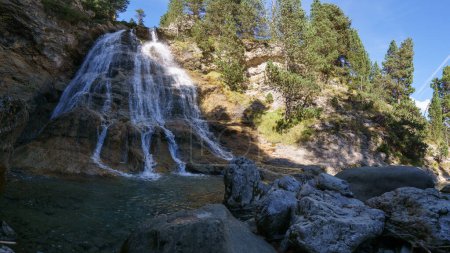 Photo for Panorama of beautiful waterfall of Gave de Tourettes river in Gavarnie Valley, Pyrenees National Park, Nouvelle-Aquitaine, France - Royalty Free Image