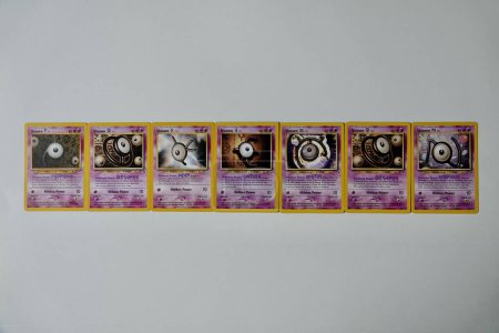 Photo for Prague, Czech Republic - April 3 2022: Word POKEMON composed of Unown Pokemon cards. The Pokemon Trading Card Game is a collectible card game based on Nintendos Pokemon franchise. - Royalty Free Image