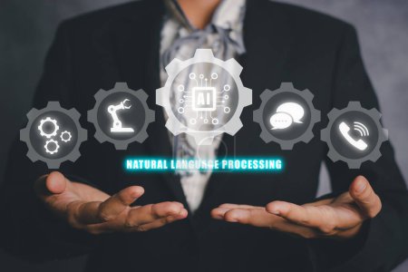 Photo for NLP natural language processing cognitive computing technology concept, Business person hand holding VR screen NLP icon on office desk, AI Artificial intelligence. - Royalty Free Image
