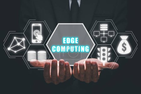 Foto de Edge computing modern IT technology concept, Businessman hand holding edge computing icon on virtual screen, Business, technology, internet and networking - Imagen libre de derechos