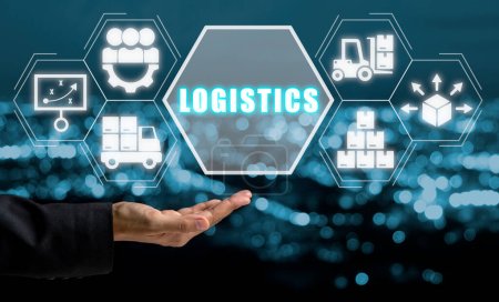 Photo for Logistics concept, Businessman hand holding logistics icon on virtual screen. - Royalty Free Image