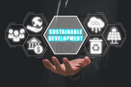 Photo for Sustainable develpment concept, Businessman hand holding sustainable develpment icon on virtual screen. - Royalty Free Image
