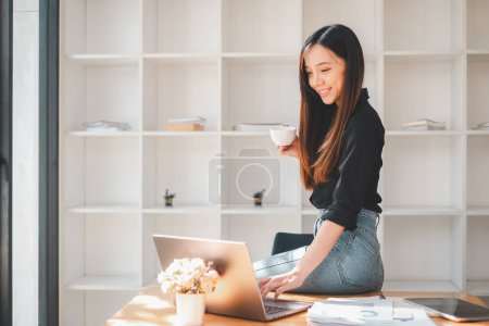 Photo for Business woman manager accounting analyst checking bills, analyzing sales statistics management, taxes financial data documents or marketing report papers working in office using laptop computer. - Royalty Free Image