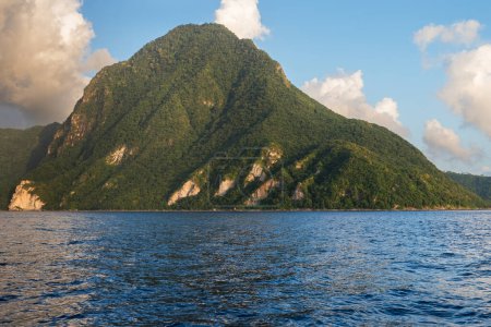 Gros Piton which is 2,618 feet, rises above the Caribbean Sea on the Island of St. Lucia.