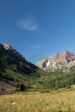 A vast landscape of various vegetation forests and picturesque scenery for visitors to the Maroon Bells Wilderness in Central Colorado. 