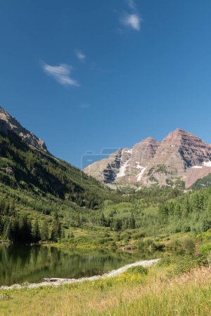 Photo for Maroon Bells Snowmass Wilderness Area surrounds the location where tourists and recreational enthusiasts, can enjoy the idyllic scenery which is world famous. - Royalty Free Image