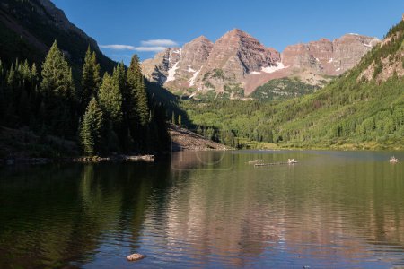Photo for A diffused reflection of the Maroon Bells on Maroon Lake, which is visited by tourists from many nations for the scenic beauty of the area. - Royalty Free Image