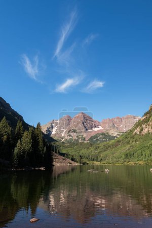 Photo for Gentle Morning Light on The Majestic Maroon Bells near Aspen Colorado with reflections of the mountains on Maroon Lake. - Royalty Free Image