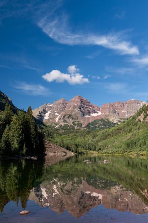 Photo for An early morning Summer morning in the valley with the view of the Maroon Bells, which are located south of Aspen Colorado. - Royalty Free Image