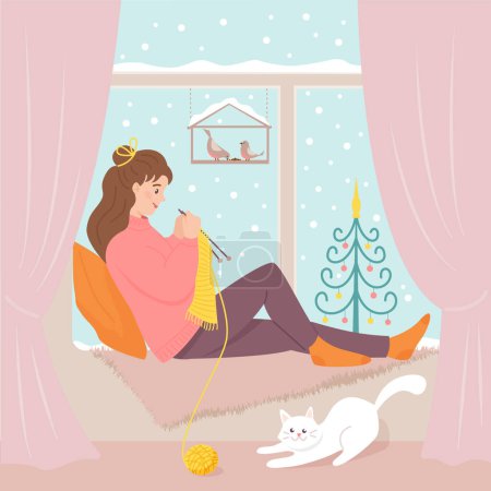 Téléchargez les photos : Une jeune femme s'assoit près de la fenêtre et tricote pendant qu'un mignon chat chasse une écheveau de fils. Illustration vectorielle couleur hiver. - en image libre de droit