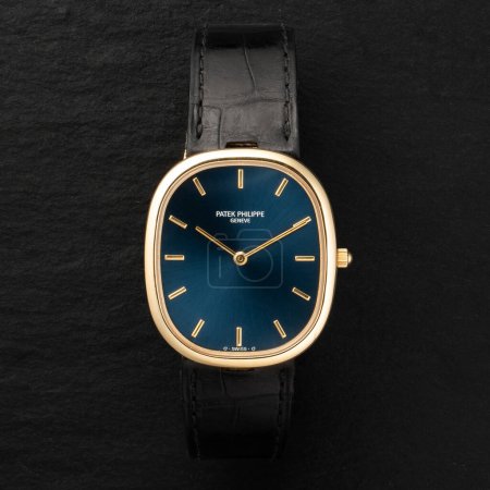Photo for Milan Italy_ November 9, 2023. old luxury watch, circa 1970, Ellipse model by Patek Philippe. dark background - Royalty Free Image