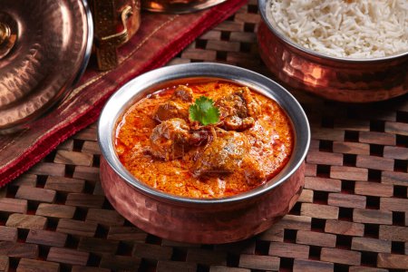 Photo for Lamb Rogan Gosht, mutton korma karahi with white rice served in dish isolated on table side view of middle east food - Royalty Free Image
