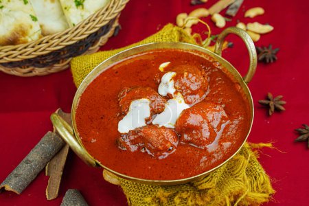 Photo for Chicken makhani or chicken butter masala korma rogan with bread served in karahi isolated on table top view of indian, pakistani and punjabi spicy food - Royalty Free Image