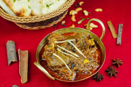 Photo for Mutton bhuna korma rogan goshat with bread served in karahi isolated on table top view of indian, pakistani and punjabi spicy food - Royalty Free Image