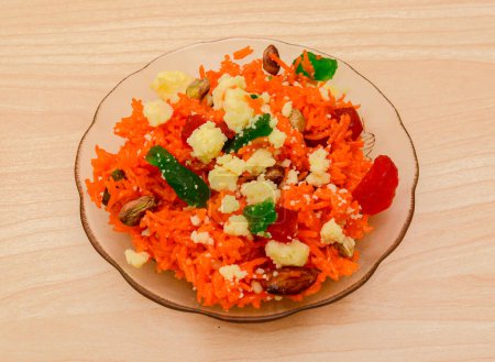 zarda or jorda rice with almond, khya and nuts served in dish isolated on table top view indian sweet food-stock-photo