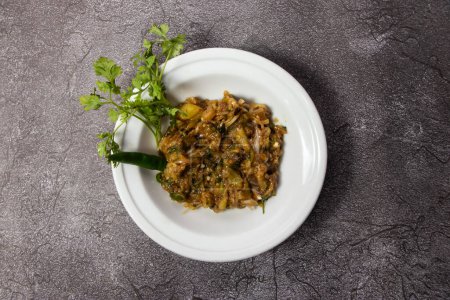 Photo for Begun Bhorta or mashed eggplant served in dish isolated on background top view of bangladesh food - Royalty Free Image
