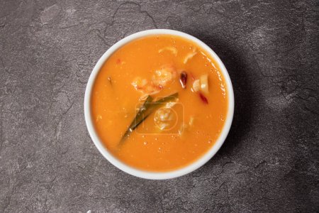 Photo for Thai Thick Soup with prawn, shrimp and chicken served in bowl isolated on background top view of bangladesh food - Royalty Free Image