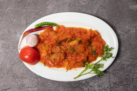 Photo for Tomato Bhorta with onion, green chilli bharta and vorta served in dish isolated on background top view of bangladesh food - Royalty Free Image