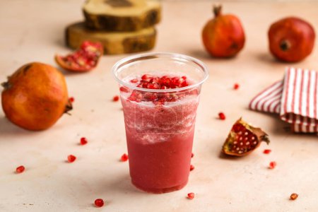 Photo for Fresh Pomegranate Juice with raw seeds served in glass isolated on table top view healthy morning drink - Royalty Free Image