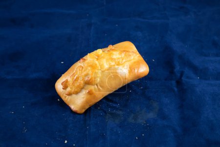 Photo for Beef Roll isolated on blue background side view of savory snack food - Royalty Free Image