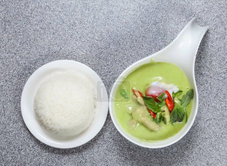 Photo for Chicken green curry with rice served in dish isolated on grey background top view of hong kong food - Royalty Free Image