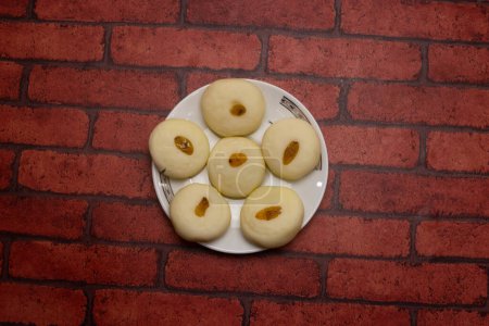Photo for Sandesh or Shondesh sweet served in plate isolated on background top view of bangladeshi dessert food - Royalty Free Image