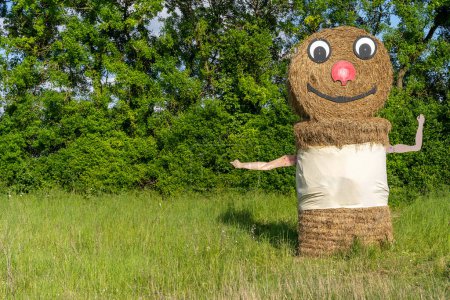 Cheerful Straw Sculpture Greeting in Nature
