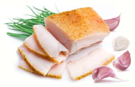 Téléchargez les photos : Salo slices or salt pork fatback slices with garlic and green onion isolated on white background. - en image libre de droit
