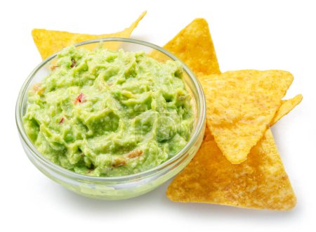 Guacamole sauce and tortilla chips, popular Mexican food  isolated on white background. 