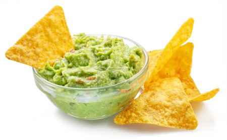 Photo for Guacamole sauce and tortilla chips, popular Mexican food  isolated on white background. - Royalty Free Image