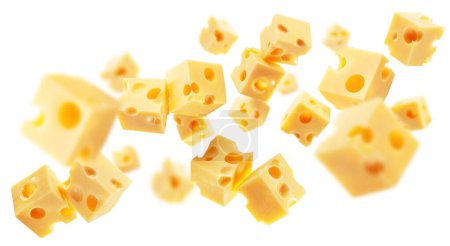 Foto de Cubos de queso emmental o Maasdam volando en el aire sobre fondo blanco. Cuadro conceptual. - Imagen libre de derechos